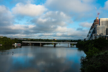 Fototapeta na wymiar Downtown Austin Texas Views of LadyBird Lake on A Sunny Day with White Clouds 