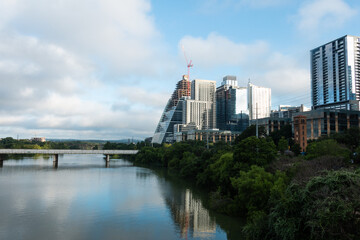 Fototapeta na wymiar Downtown Austin Texas Views of LadyBird Lake on A Sunny Day with White Clouds 