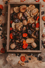 Healthy food dried fruits. prunes, dried apricots, raisins, figs, nuts. Top view. Copy space.