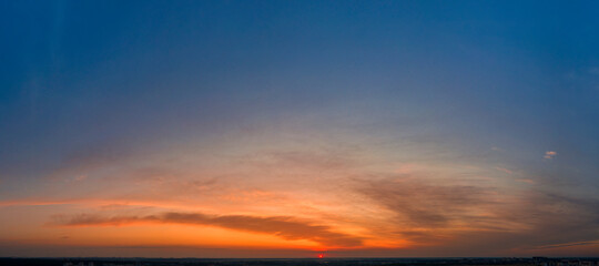 Naklejka na ściany i meble Dawn sky, sunbeams and dreams, morning panorama.