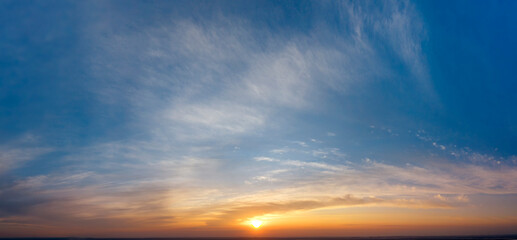 Dawn sky, sunbeams and dreams, morning panorama.