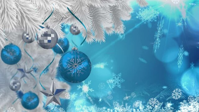 Animation of christmas boubles over blue background with snow falling