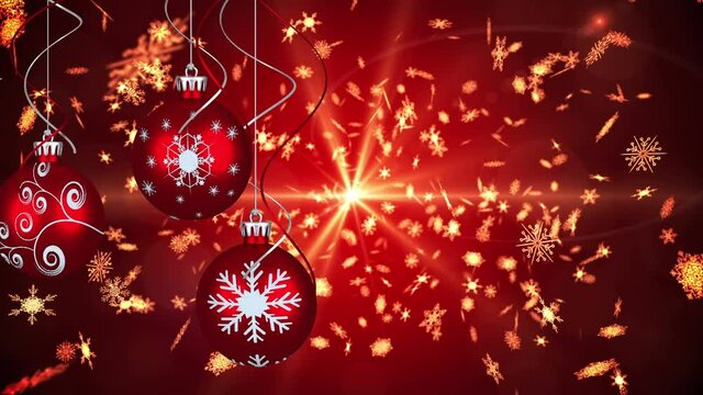 Animation of christmas boubles and snow falling and glowing light over red background