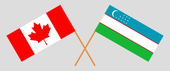 Crossed flags of Canada and Uzbekistan. Official colors. Correct proportion