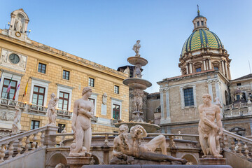 Fototapeta na wymiar Praetorian Fountain and Palace and San Giuseppe dei Teatini church on so called Square of Shame in Palermo city, Sicily Island, Italy