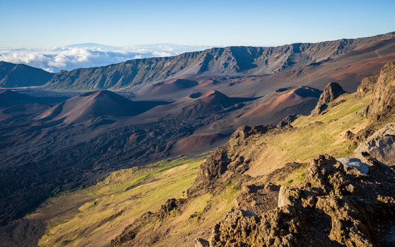 Looking down into the crater of Haleakalā Volcano, or the East Maui Volcano, which is a massive shield volcano that forms more than 75% of the Hawaiian Island of Maui. 