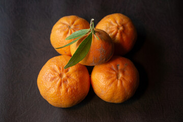 tangerines on a wooden background