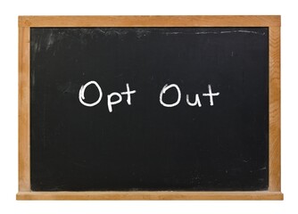 Opt out written in white chalk on a black chalkboard isolated on white