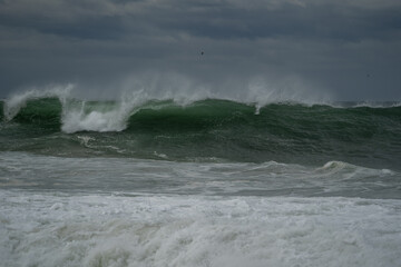 big waves breaking on the beach