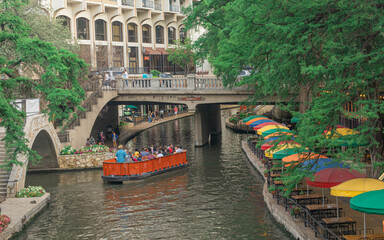 San Antonio Riverwalk Umbrellas, Texas, during pandemic COVID 19, the people get a good time.