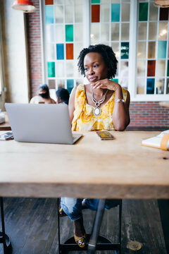 Woman Working On Laptop At Coworking Modern Office