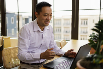 Mature Asian man on video call