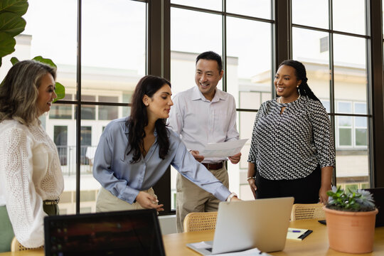 Diverse Business People Meeting At Laptop In Office