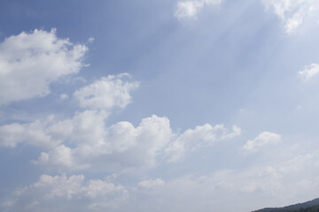 bright cumulus cloud and blue sky