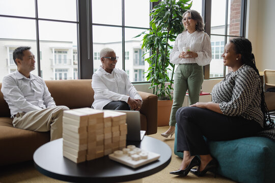 Diverse Business team meets in office, Mature Asian woman leadership 