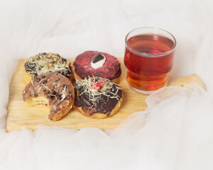 Donuts with various toppings. A delicious snack that is suitable to eat in your spare time. Potato-based donuts are healthy for your body if consumed in the right amount. Sweet and savory donuts.