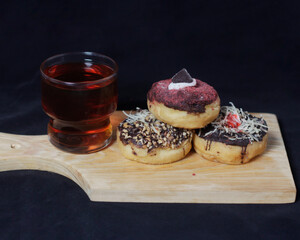 Donuts with various toppings. A delicious snack that is suitable to eat in your spare time. Potato-based donuts are healthy for your body if consumed in the right amount. Sweet and savory donuts.