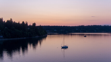 Sailboat on the Puget Sound at sunset 