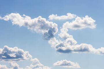 Clouds on a clear sunny summer day.