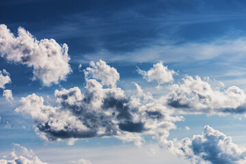 Clouds on a clear sunny summer day.