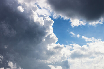 Cumulonimbus clouds on a clear sunny summer day.