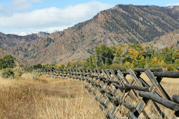 Wooden fence and mountains, Wyoming