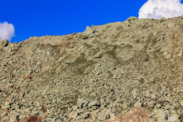 View of slag heaps of iron ore quarry. Mining industry