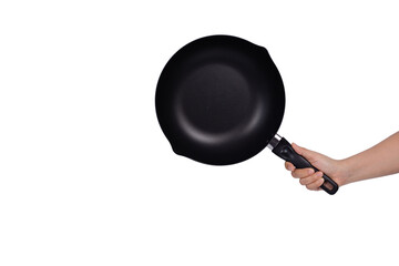 Women hand holding black fry pan isolated on white background. 