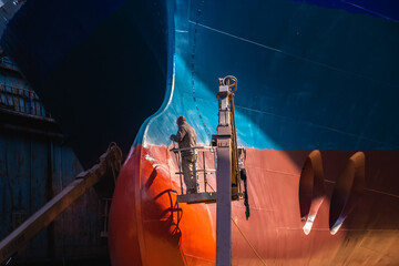 Painting the bottom of the ship
