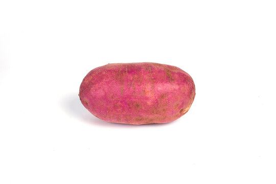 Purple sweet potato isolated on white background