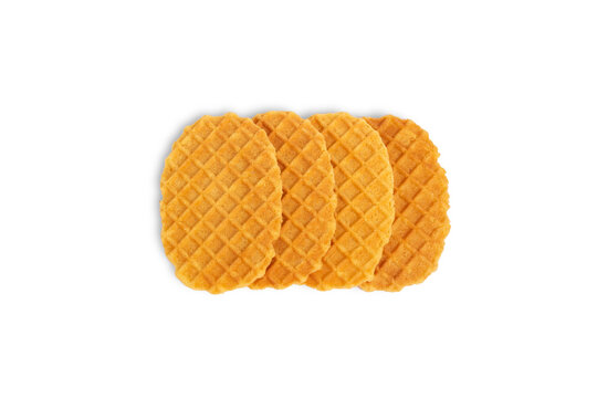 Stack of crispy waffles isolated on white background