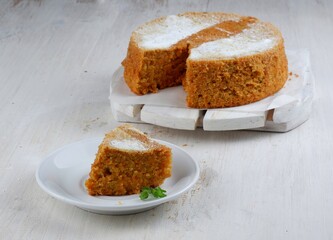 homemade carrot cake , on white background.
