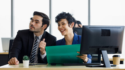 Diversity businesspeople man and woman working together in modern office.