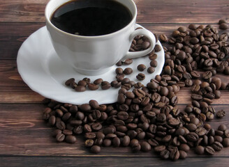 a cup of coffee and grains on the table