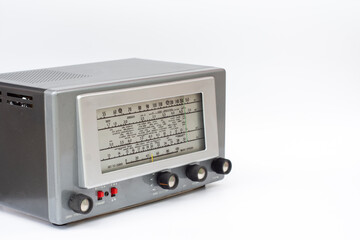 Fototapeta premium old radio with metal casing where you can listen to shortwave broadcasts from all over the world. You can listen to the radio broadcast of all countries and capitals. Selective Focus