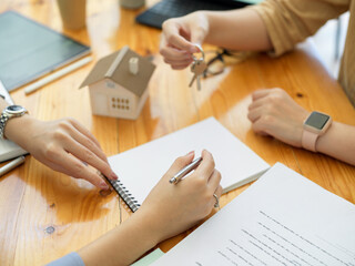 Fototapeta na wymiar Closeup, real estate agent negotiation with residential buyer