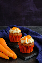 carrot cakes in close-up on a dark background