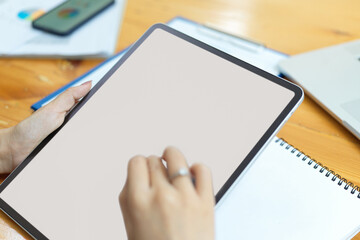 Close up, Female hands holding digital tablet, tablet blank screen mockup