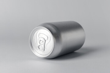 Can of soda on grey background