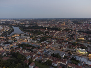 Fototapeta na wymiar Aerial view of world famous skyline of Regensburg in Bavaria, Germany with cathedral and old town at night
