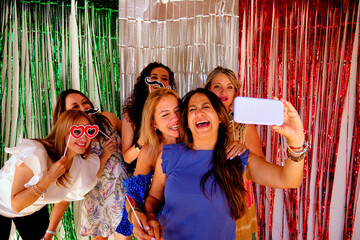 Cheerful Woman Taking Selfie With Female Friends