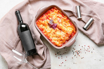 Composition with tasty tomato lasagna on light background