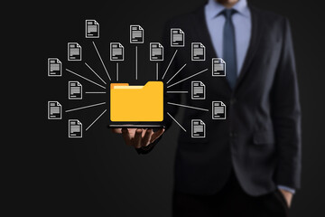 Document Management System (DMS).Businessman hold folder and document icon.Software for archiving, searching and managing corporate files and information.Internet Technology Concept.Digital security.
