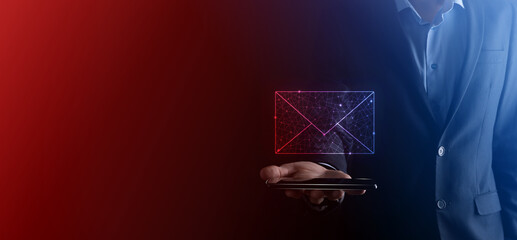 Businessman hand holding e-mail icon, Contact us by newsletter email and protect your personal...