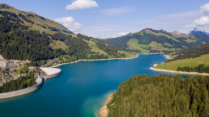 Fototapeta na wymiar The lake of l'Hongrin and its dam, Switzerland. 