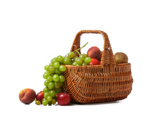 Fototapeta na wymiar Basket with fresh fruits on white background