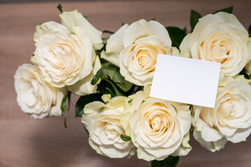 Gettig frame mock up card o white roses. Empty copyspace for text