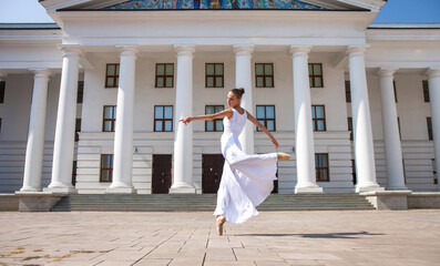 young ballerina dancing in the street © Andrey_Arkusha