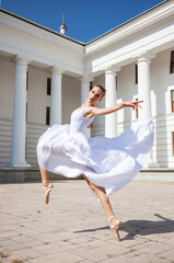 young ballerina dancing in the street © Andrey_Arkusha