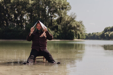 A man in a brown shirt
